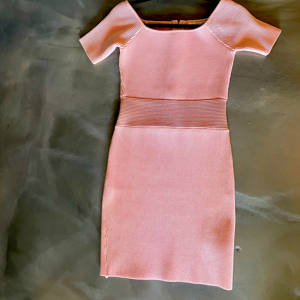 Look gorgeous in light pink sexy dress. Worn few times